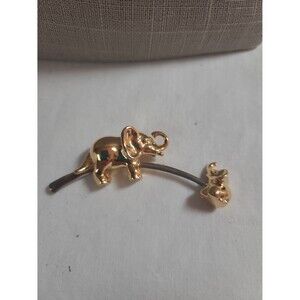 Vintage elephant slides to baby elephant